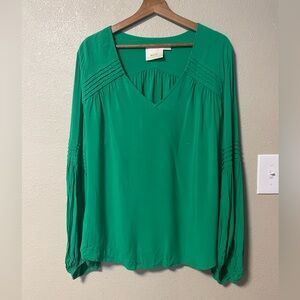 Maeve Anthropologie blouse green with shoulder and balloon sleeve details